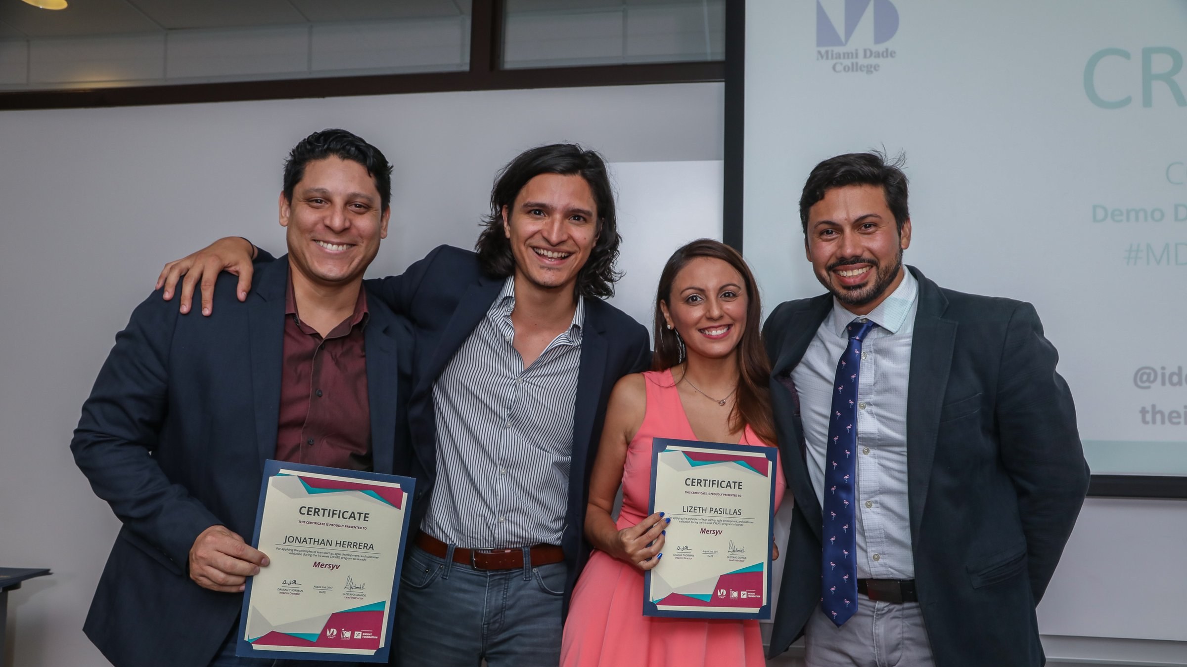 Jonalex Herrera and Liz Pasillas holding CREATE certificates at The Idea Center