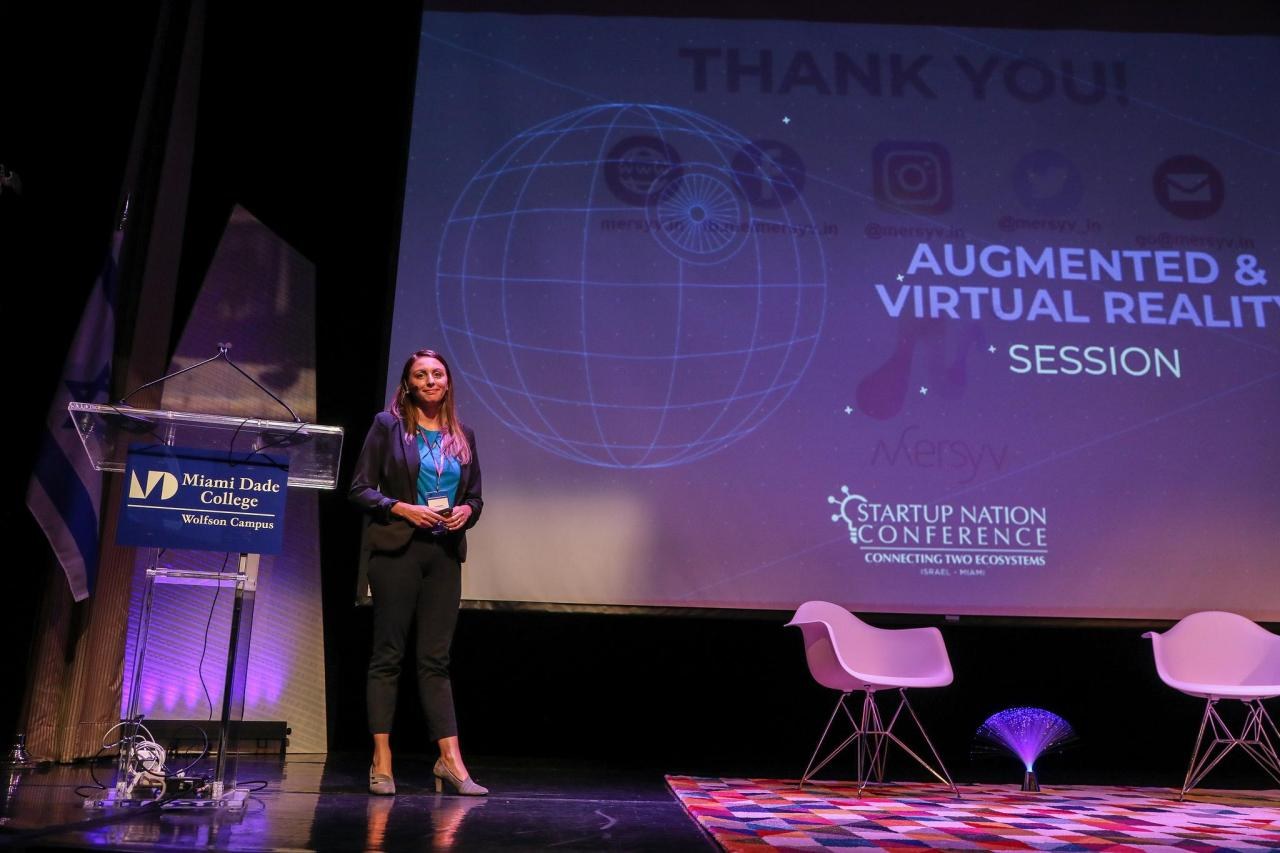 Liz Pasillas on stage at the augmented and virtual reality session, Miami Dade College Wolfson Campus